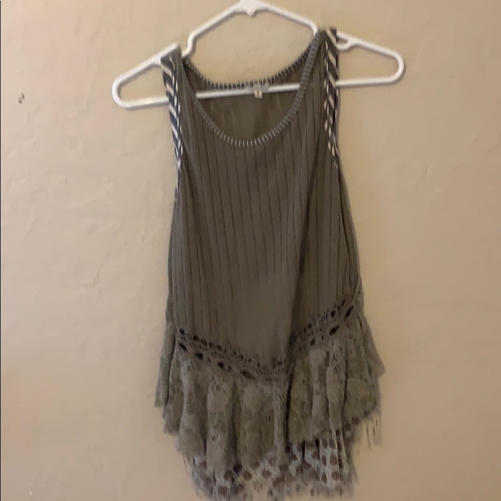 Gimmicks tank top with peek a boo back